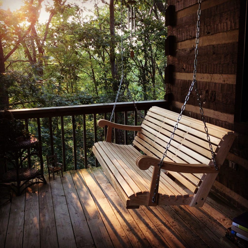 july cabin porch swing
